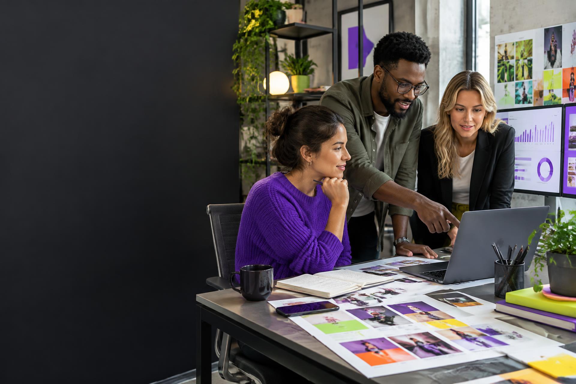 A KGHQ marketing team developing campaigns together in a creative studio